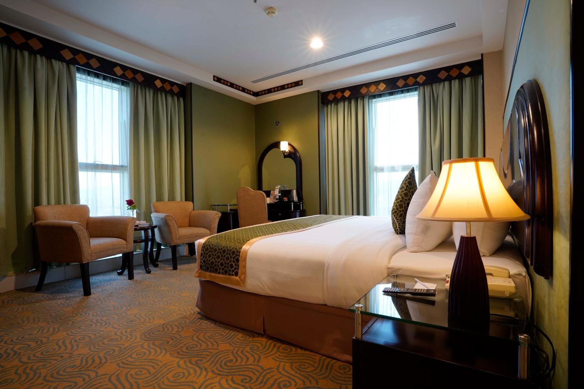 Awaliv International Hotel Ta'if Quarto foto A bedroom at the hotel
