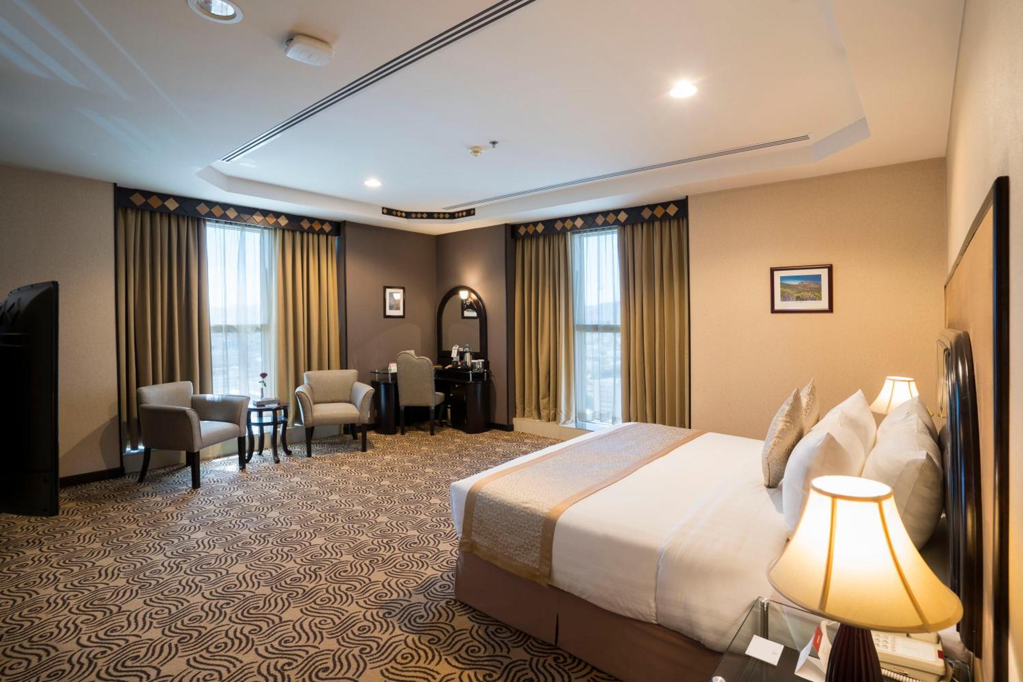 Awaliv International Hotel Ta'if Quarto foto A room at the hotel